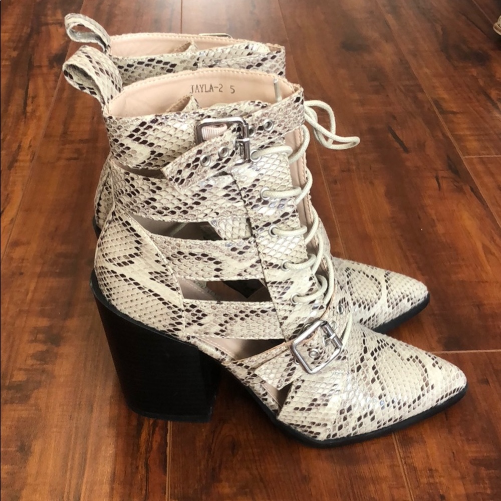 Snake print heeled booties